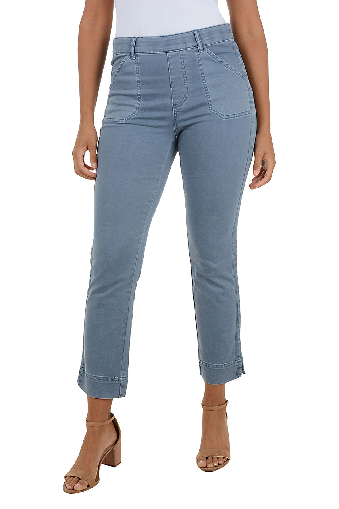 Light blue jeans worn by a person on a white background