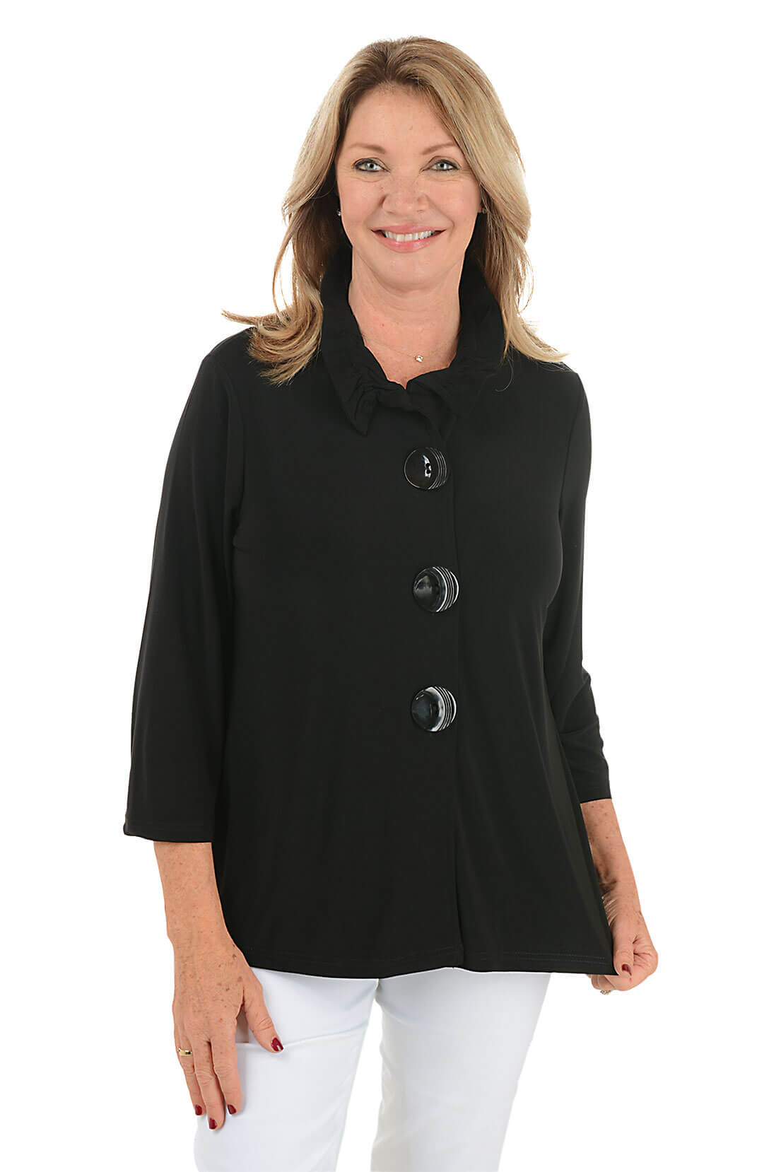Woman wearing a black coat with buttons on a white background.