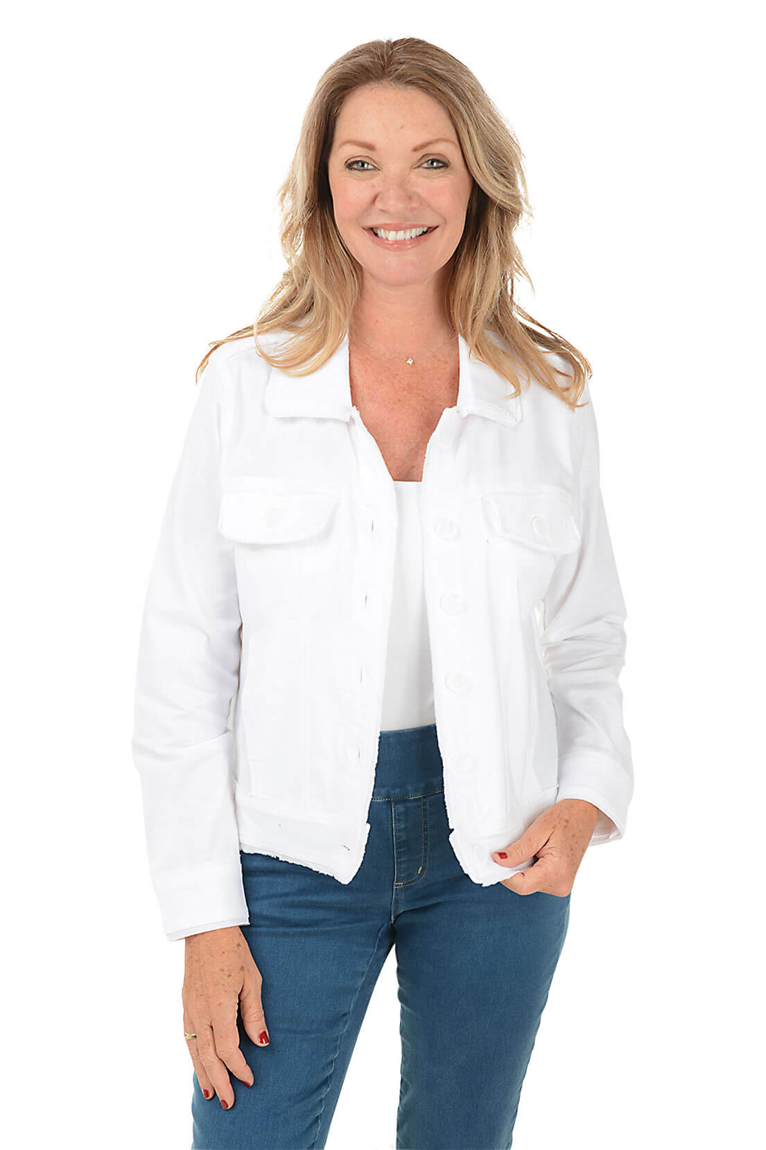 Woman wearing a white jacket and blue jeans on a white background