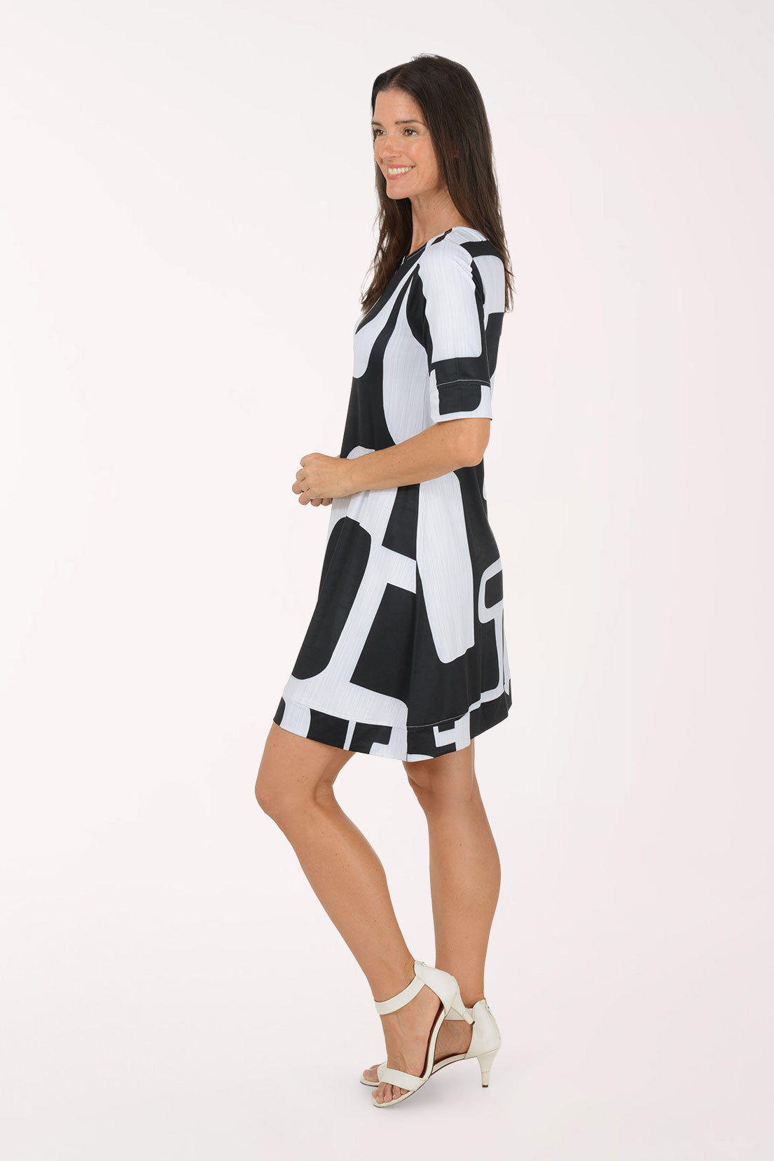 Tango Mango Modern Shapes UPF50 Elbow Sleeve Dress, side view, bold black and white geometric shapes