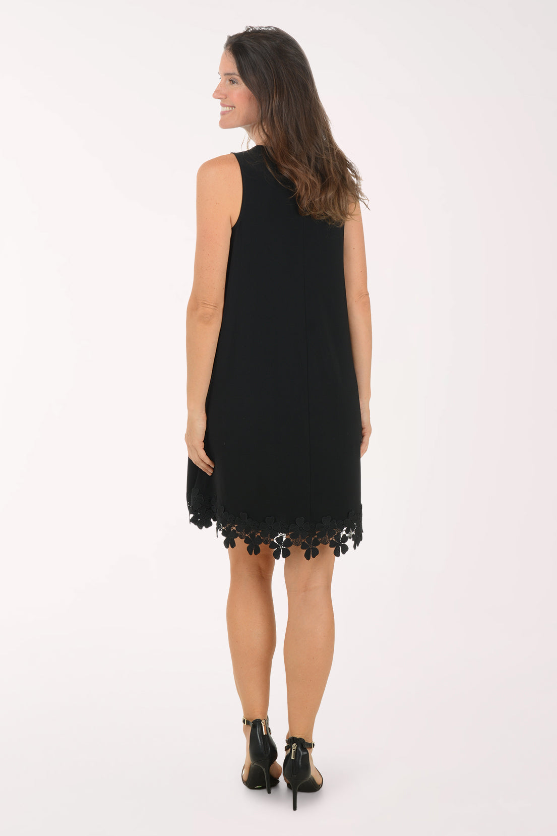 Back view of the black Floral Lace Hem dress showing the sleeveless back, the A-line shape and the floral lace border at the hem