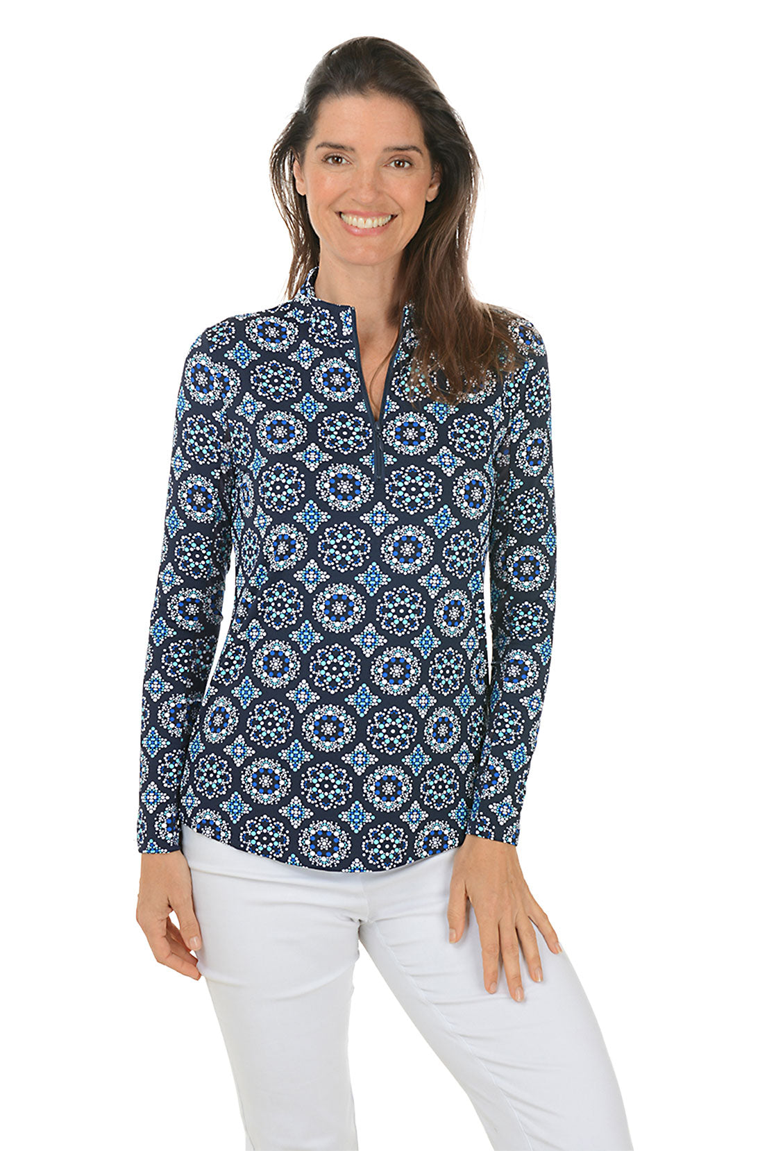 A front shot of a model wearing a mock neck, long sleeve top with a geometric pattern, in colors blue and white.