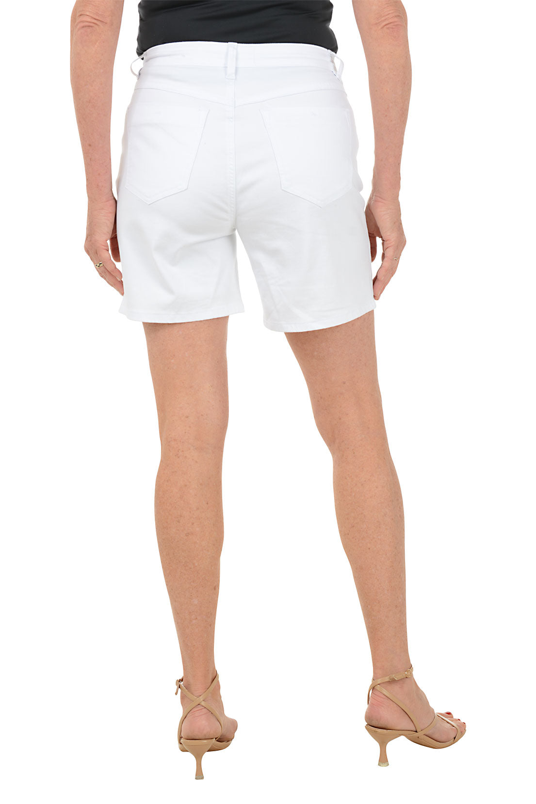 White shorts with brown buttons worn by a person on a white background