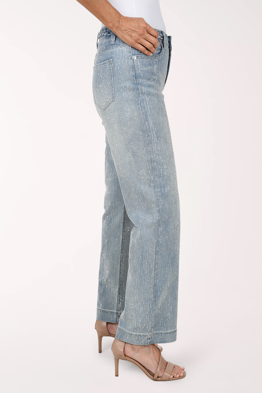 Side view of the light-wash rhinestone denim pants showing the wide leg and rhinestone sparkle down the side.