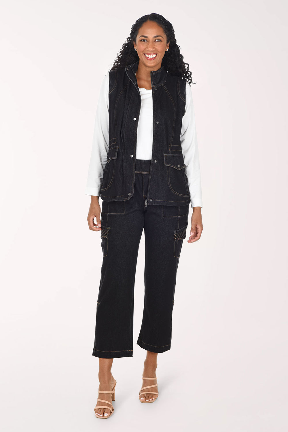 Woman wearing black denim cargo pants
