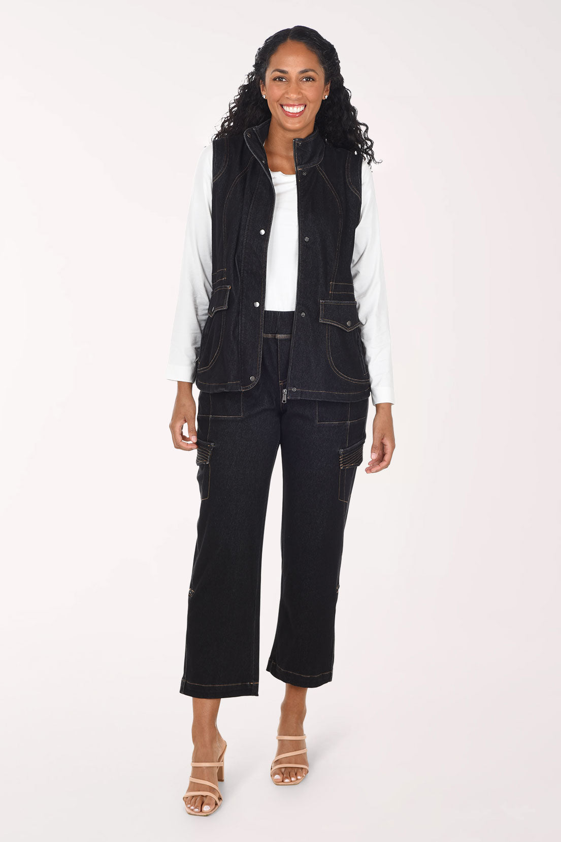 Woman wearing black denim cargo pants