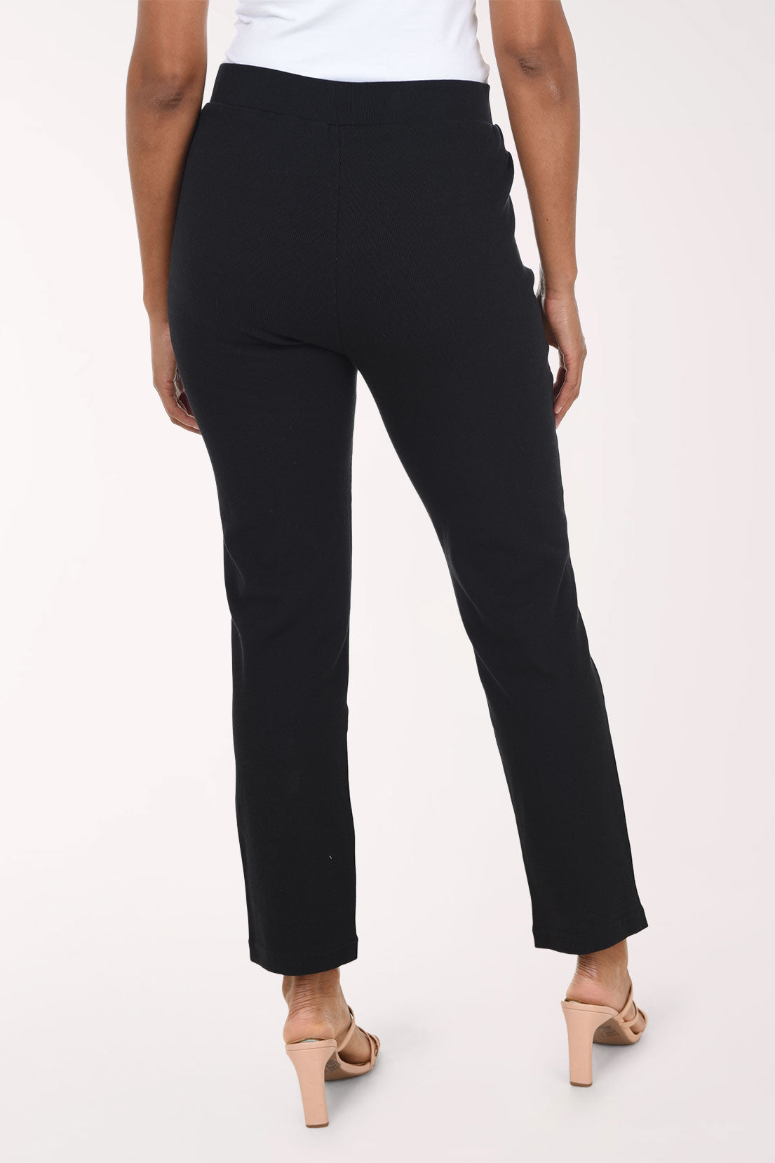 Woman wearing pull-on black ankle pants