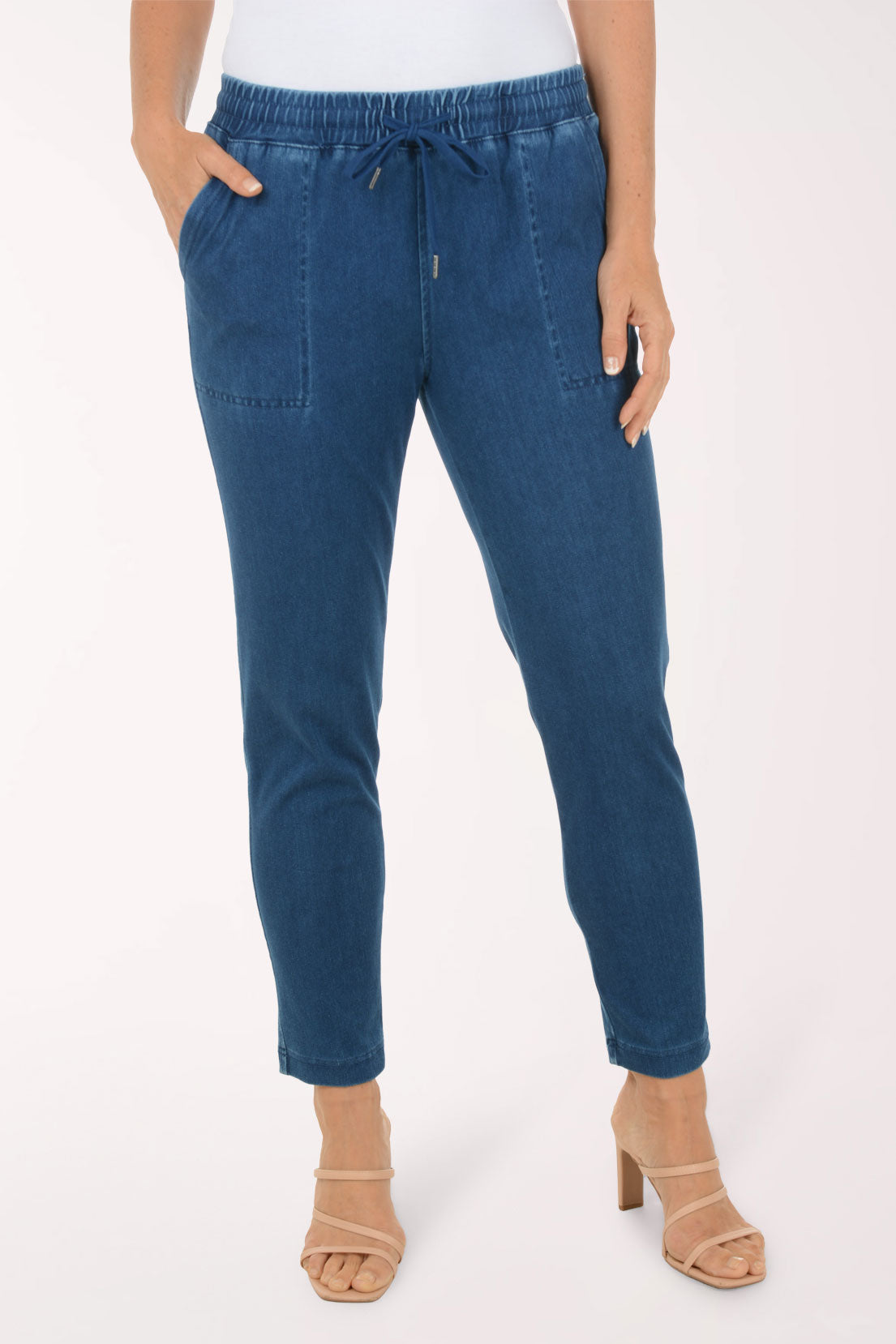 Close-up of the drawstring waist and front pocket on the Medium Wash Denim Drawstring Relaxed Denim Pant
