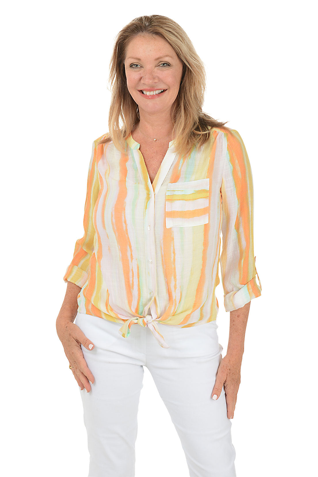 A front shot of a woman wearing a striped button-front blouse with a mandarin collar and long sleeves.