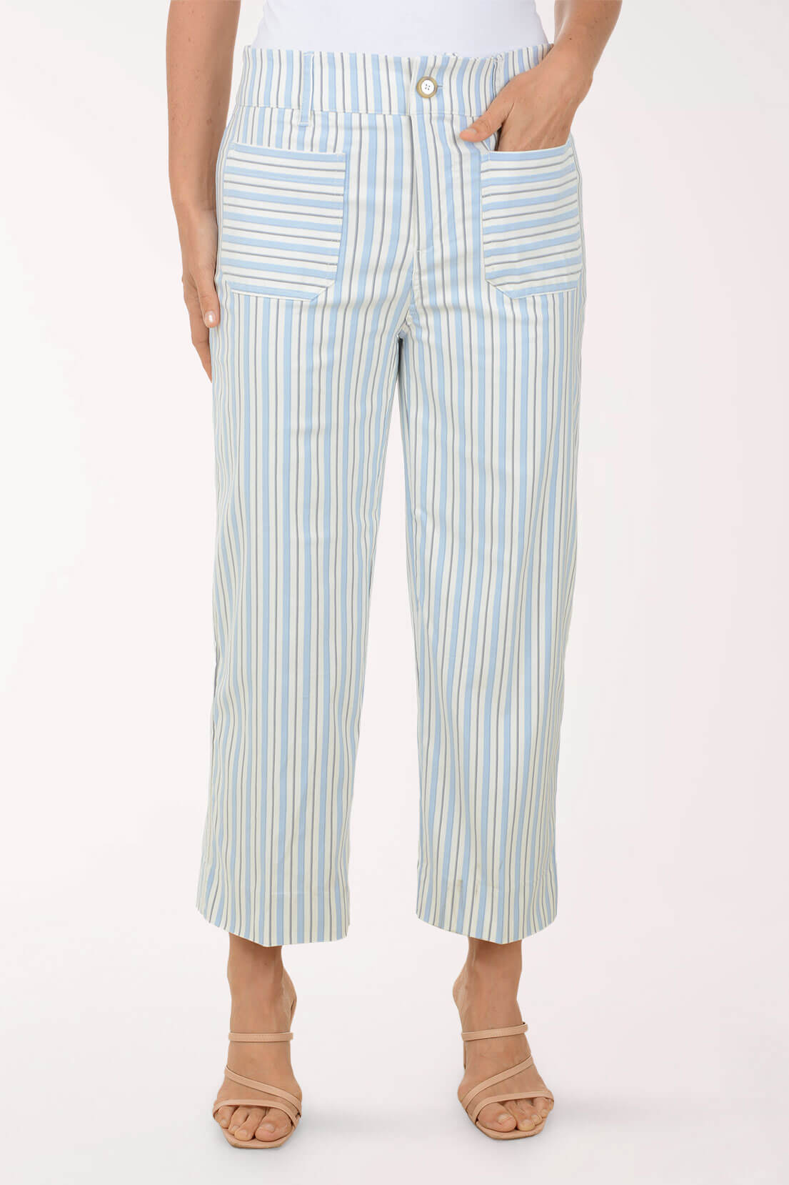 Striped pants worn by a person on a white background