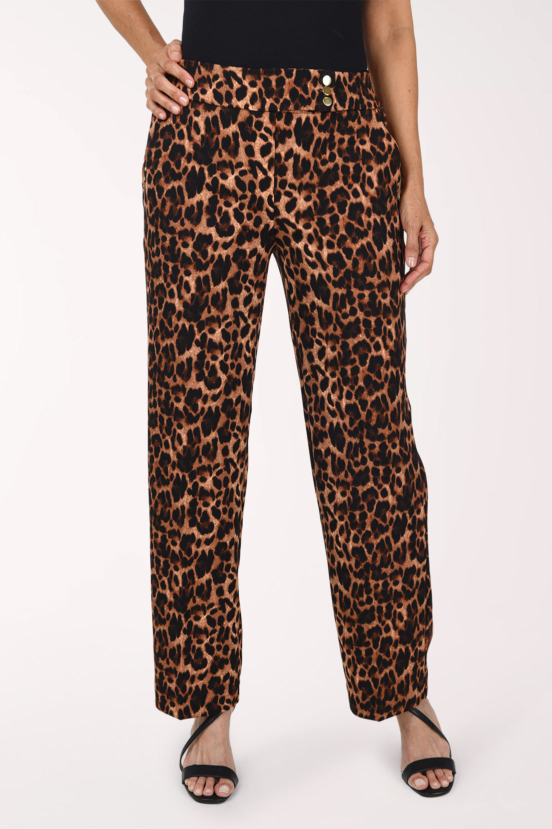 Woman wearing full length animal print pants