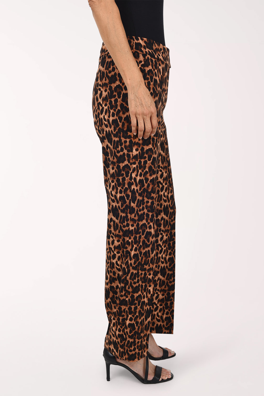 Woman wearing full length animal print pants