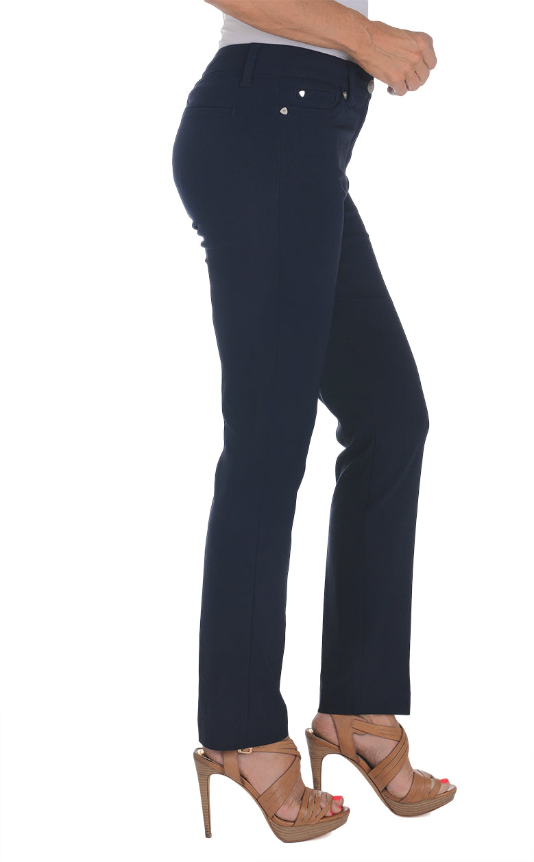 A side shot of a model wearing a pair of navy blue, full-length pants with a button-closure and zip-fly, displayed on a model without a visible waist belt.