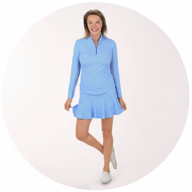 Model wearing IBKUL top and skort 