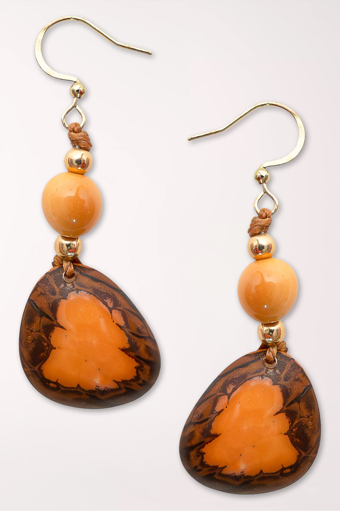 Earrings with orange colored beads 