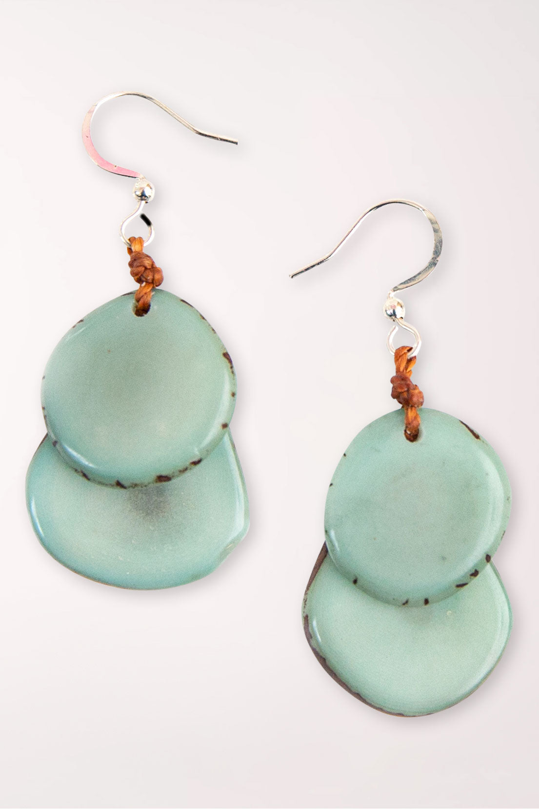 Earrings with light blue colored beads 