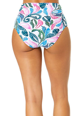 High-waisted bikini bottom with colorful leaf pattern on a white background