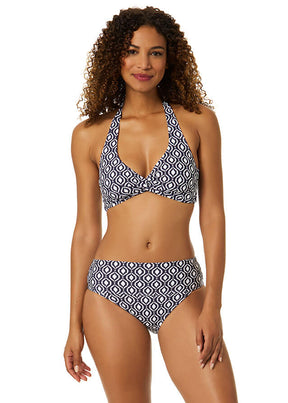 Woman wearing a patterned bikini set on a white background