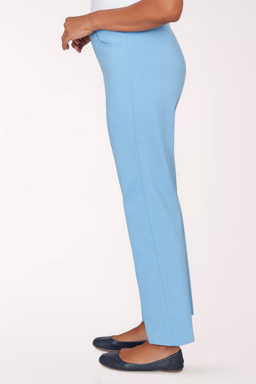 Light blue pants worn by a person on a white background