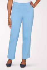 Light blue pants worn by a person on a white background