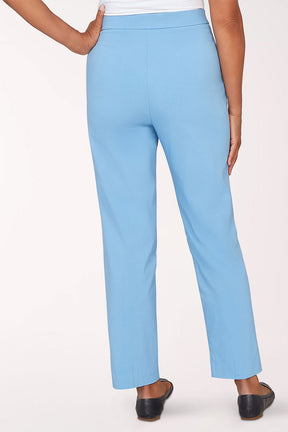 Light blue pants worn by a person on a white background