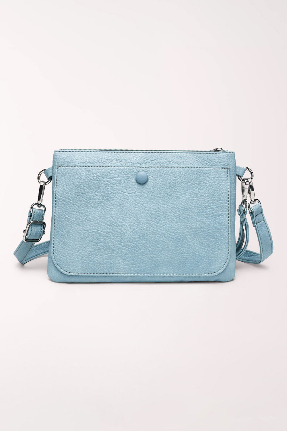 Front view of the 22 Tote Two-Sided Crossbody Bag in baby blue faux leather: a rectangular bag with a front flap pocket closed by a snap button, silver hardware and an adjustable crossbody strap.