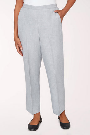 Light gray checkered pants worn by a person on a white background