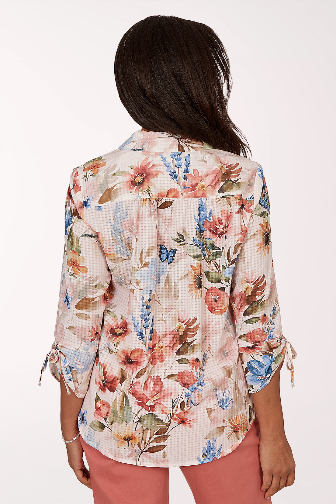 Woman wearing a floral button down top