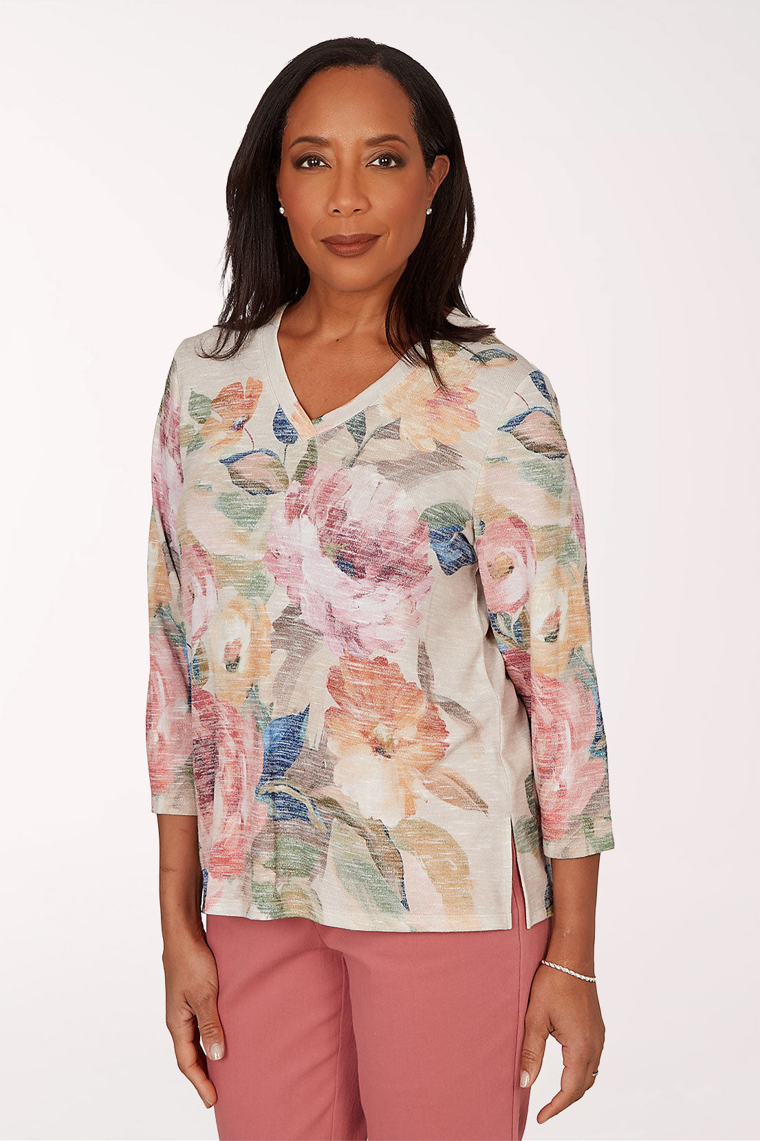 Woman wearing a floral 3/4 sleeve top