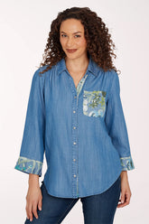 Woman wearing a chambray top