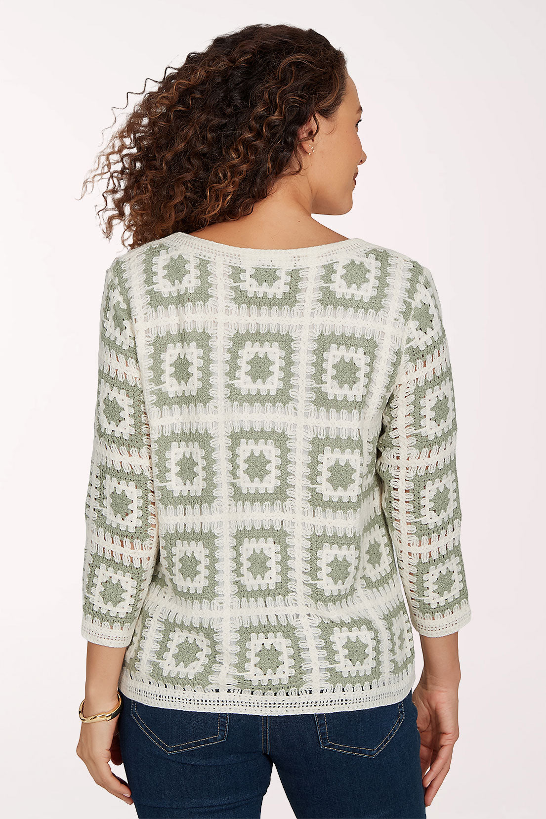 Woman wearing a crochet top