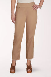 Beige pants worn by a person on a white background