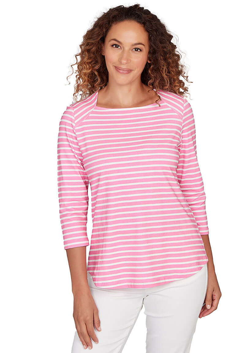 Woman wearing a pink and white striped long-sleeve shirt on a white background