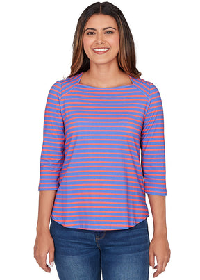Woman wearing a blue and pink striped shirt on a white background