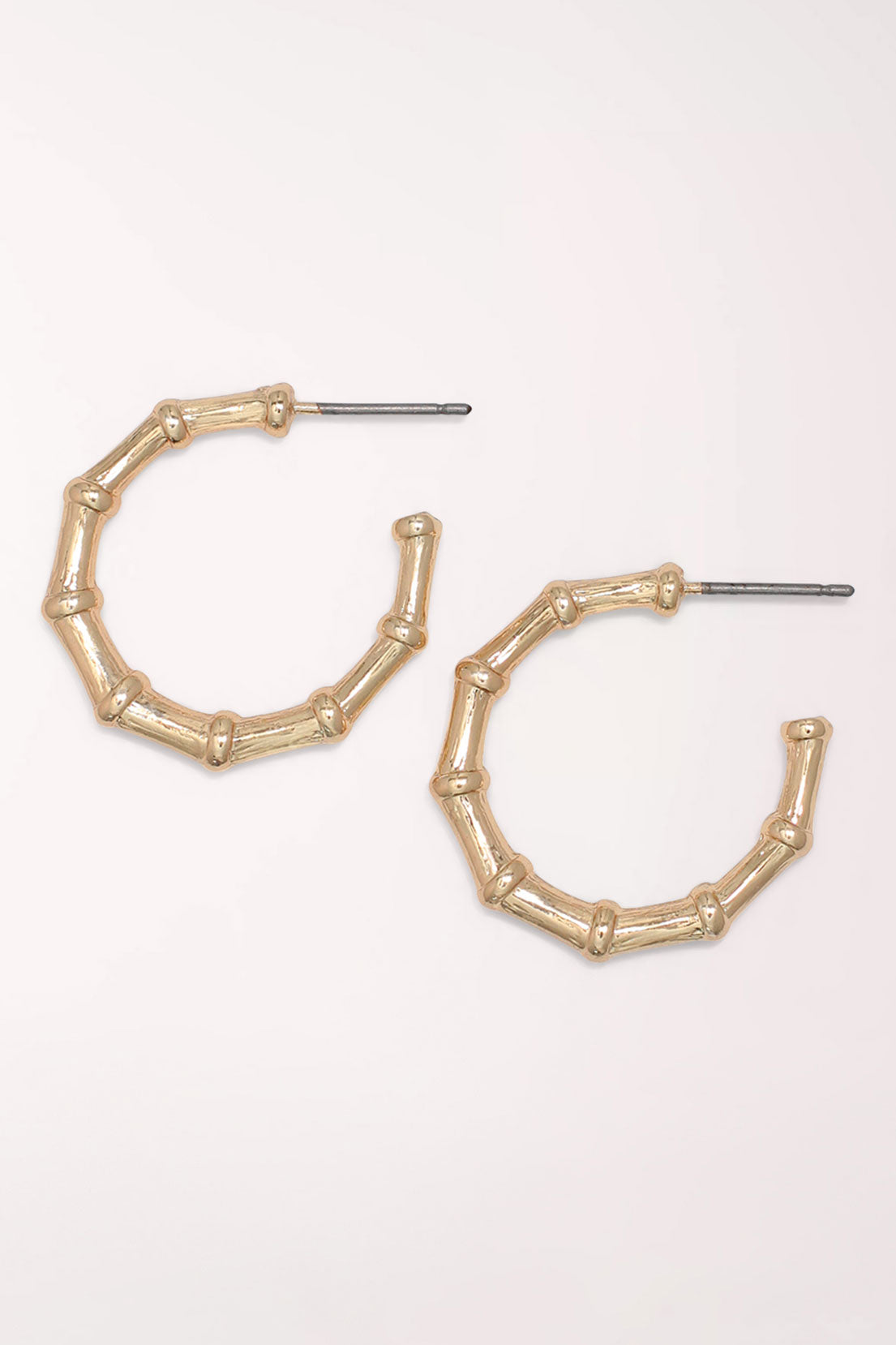 Pair of Periwinkle Gold Bamboo Hoop Earrings: matte gold-tone open hoops shaped like segmented bamboo, on posts.