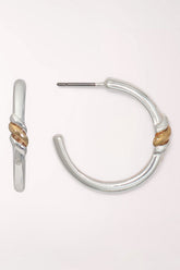 Periwinkle Polished Silver And Gold Twisted Hoop Earrings shown from the side and front: polished silver-tone open hoops on posts with a twisted gold and silver wrap accent near the top.