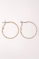 Pair of Periwinkle Gold Delicate Textured Hoop Earrings: thin gold-tone hoops with a lightly hammered texture and a snapback post closure.