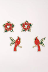 Periwinkle Cardinals And Poinsettias Earrings Set with two pairs of studs: red enamel poinsettias with crystal centers and red enamel cardinals perched on green leafy branches, all with gold-tone edges.