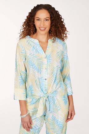 Woman wearing a tie-dye outfit on a white background