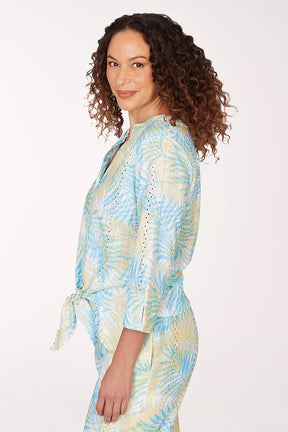 Woman wearing a tie-dye outfit on a white background
