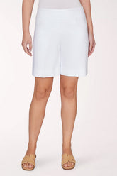 White shorts worn by a person on a white background