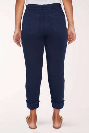 Navy blue pants worn by a person on a white background