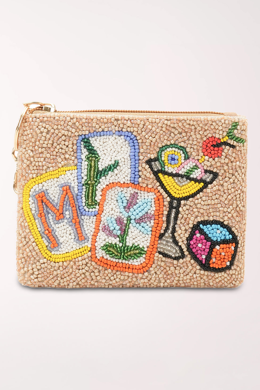 A small zip pouch covered in beige seed beads with colorful embroidered-style motifs including a cocktail glass, a cube, a letter M, and botanical cards.