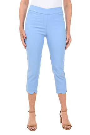 Light blue capri pants worn by a person on a white background