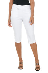 Person wearing white capri pants on a white background