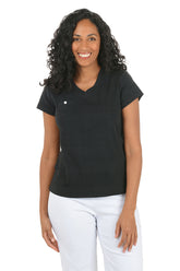 Woman wearing a black V-neck shirt with a white button on a white background.