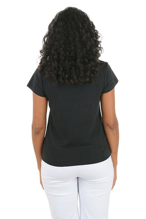 Woman wearing a black V-neck shirt with a white button on a white background. Back shot.