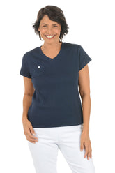 Woman wearing a navy blue short sleeve v-neck top with a pocket on a white background.