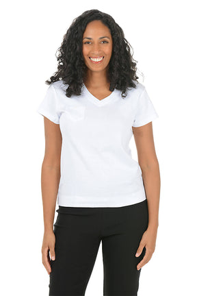 Woman wearing a white shirt and black pants on a white background front shot.