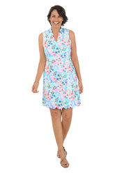 Woman wearing a floral dress on a white background